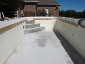 Inside the pool with concrete steps