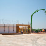 Concrete pump truck next to ICF project