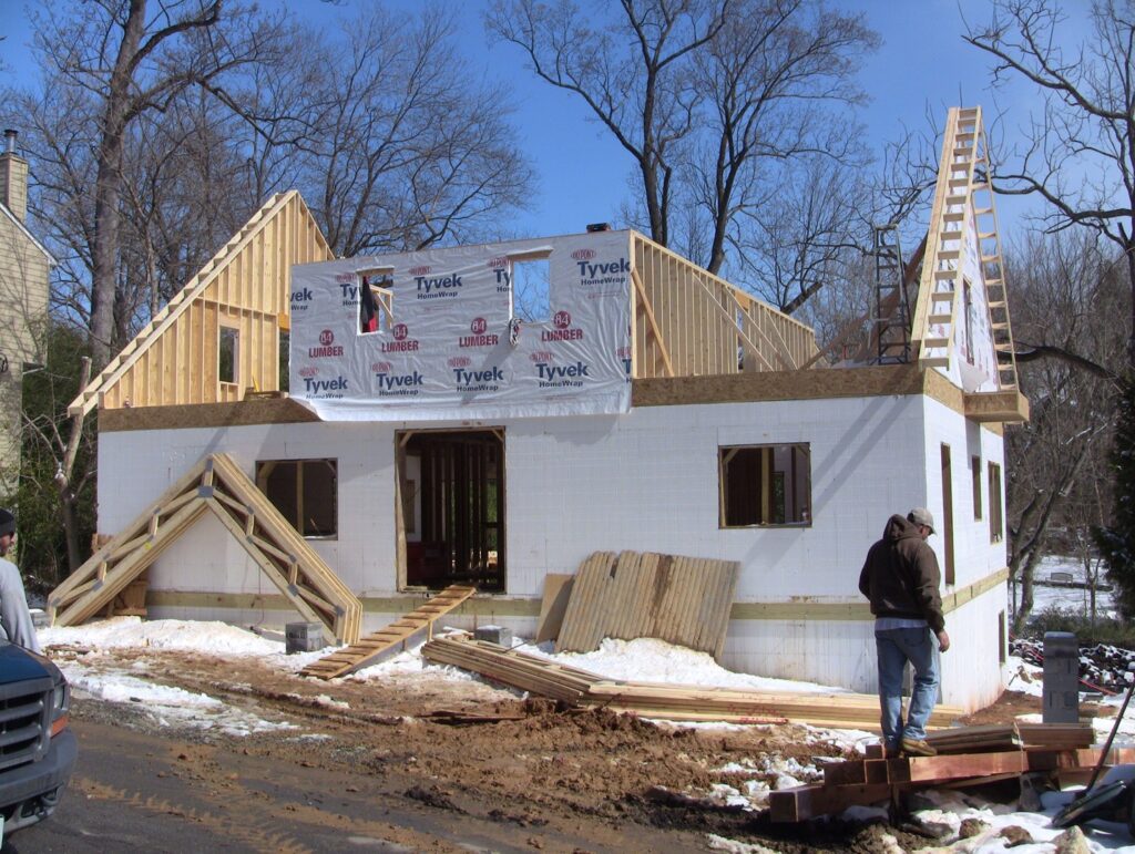 ICF Construction with Roof Truss Installation in Progress
