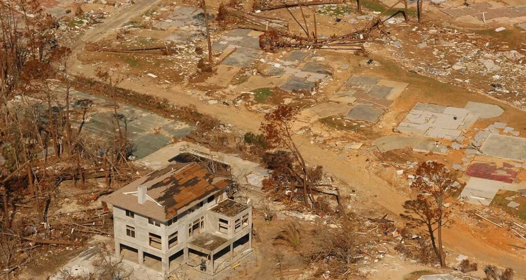 Picture of a concrete home that is the only house that survived a tornado.